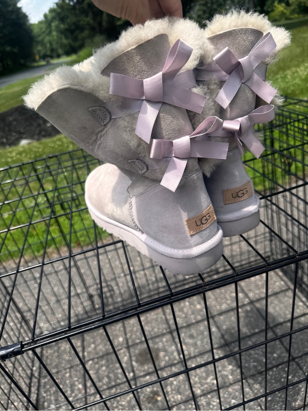 UGG Kids Bailey Bow II Suede Winter Boots in Light Gray with Pink Bows